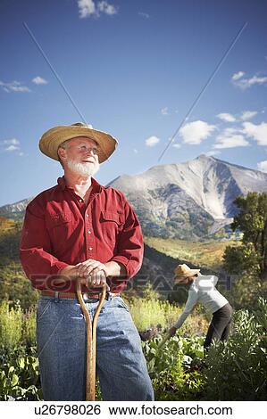 USA, Colorado, Aspen, portrait of male farmer working in field View Large Photo Image Stock Photograph - USA, Colorado, Aspen, portrait of male farmer working in field. Fotosearch