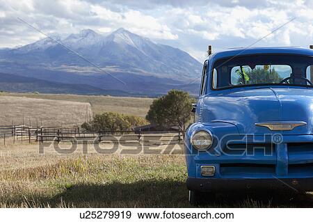 USA, Colorado, Carbondale, Blue vintage car, mount Sopris in background View Large Photo Image Stock Photo - USA, Colorado, Carbondale, Blue vintage car, mount Sopris in background. Fotosearch