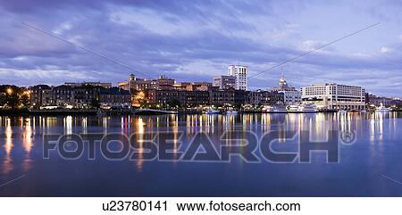 USA, Georgia, Savannah, City skyline by river View Large Photo Image Stock Image - USA, Georgia, Savannah, City skyline by river. Fotosearch