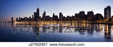 USA, Illinois, Chicago, City skyline over Lake Michigan at sunset View Large Photo Image Stock Photo - USA, Illinois, Chicago, City skyline over Lake Michigan at sunset. Fotosearch