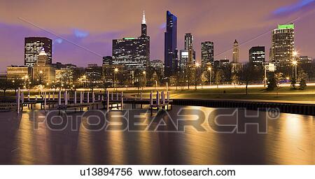 USA, Illinois, Chicago, City skyline and marina illuminated at dusk View Large Photo Image Stock Photograph - USA, Illinois, Chicago, City skyline and marina illuminated at dusk. Fotosearch