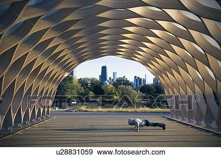 USA, Illinois, Chicago, Man exercising in Lincoln Park View Large Photo Image Stock Photo - USA, Illinois, Chicago, Man exercising in Lincoln Park. Fotosearch
