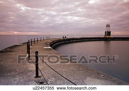 Stock Photography - USA, Illinois, Chicago, pier at sunrise. Fotosearch