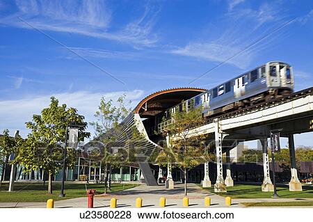 Stock Photo - USA, Illinois, Chicago, Train passing Illinois Institute of Technology. Fotosearch