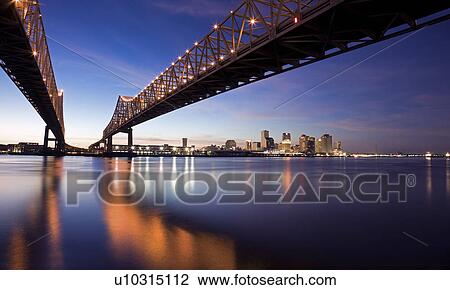 USA, Louisiana, New Orleans, Toll bridge over Mississippi River at sunset View Large Photo Image Stock Image - USA, Louisiana, New Orleans, Toll bridge over Mississippi River at sunset. Fotosearch