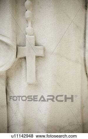 USA, Maryland, close up of cross on statue View Large Photo Image Stock Photo - USA, Maryland, close up of cross on statue. Fotosearch