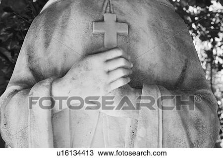 USA, Maryland, close up of statue with cross View Large Photo Image Stock Image - USA, Maryland, close up of statue with cross. Fotosearch