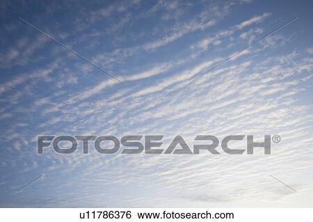 Stock Photograph - USA, Massachusetts, alto cumulus clouds. Fotosearch