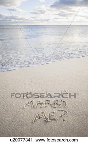 Stock Image - USA, Massachusetts, message on beach. Fotosearch