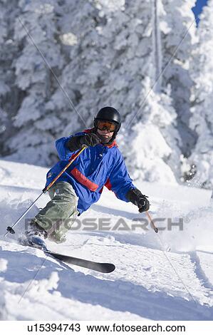 USA, Montana, Whitefish, Male skier on mountain slope View Large Photo Image Stock Image - USA, Montana, Whitefish, Male skier on mountain slope. Fotosearch