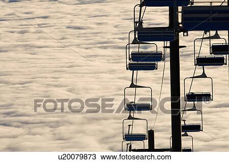 USA, Montana, Whitefish, Ski lift against clouds View Large Photo Image Stock Image - USA, Montana, Whitefish, Ski lift against clouds. Fotosearch