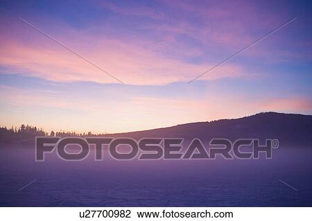 USA, Montana, Whitefish, Snow covered landscape at sunset View Large Photo Image Stock Image - USA, Montana, Whitefish, Snow covered landscape at sunset. Fotosearch