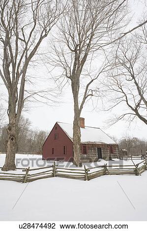 Stock Image - USA, New Jersey, Morristown, Morristown National Historical Park, Jockey Hollow, Tempe Wick House in winter. Fotosearch