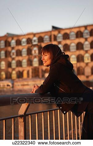 USA, New York City, Brooklyn, woman looking out on river View Large Photo Image Stock Image - USA, New York City, Brooklyn, woman looking out on river. Fotosearch