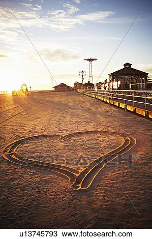 USA, New York City, Coney Island, heart shape in sand View Large Photo Image Stock Image - USA, New York City, Coney Island, heart shape in sand. Fotosearch