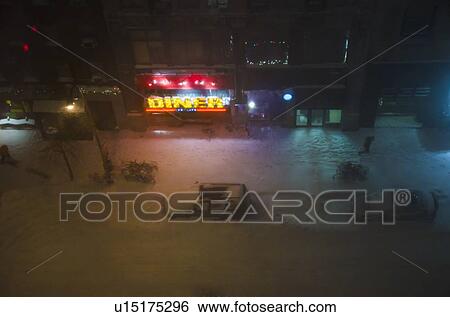 Stock Photograph - USA, New York City, Night blizzard. Fotosearch