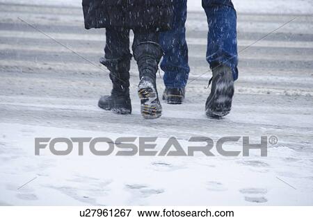 USA, New York City, Pedestrians crossing road in blizzard View Large Photo Image Stock Photo - USA, New York City, Pedestrians crossing road in blizzard. Fotosearch