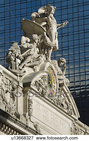 USA, New York City, Sculpture on top of Grand Central Station facade View Large Photo Image Stock Photo - USA, New York City, Sculpture on top of Grand Central Station facade. Fotosearch