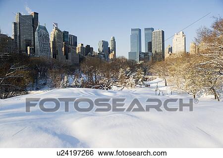 USA, New York City, View of Central Park in winter with Manhattan skyline in background View Large Photo Image Stock Photograph - USA, New York City, View of Central Park in winter with Manhattan skyline in background. Fotosearch