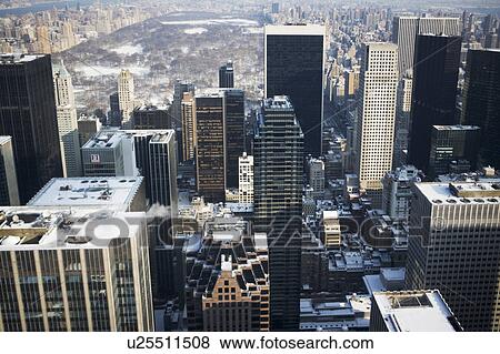 USA, New York City, View of Manhattan covered with snow, with Central Park in background View Large Photo Image Stock Photo - USA, New York City, View of Manhattan covered with snow, with Central Park in background. Fotosearch