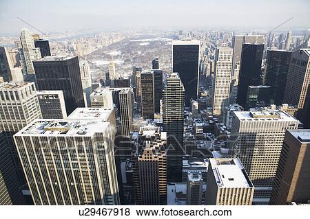 USA, New York City, View of Manhattan covered with snow, with Central Park in background View Large Photo Image Stock Photo - USA, New York City, View of Manhattan covered with snow, with Central Park in background. Fotosearch