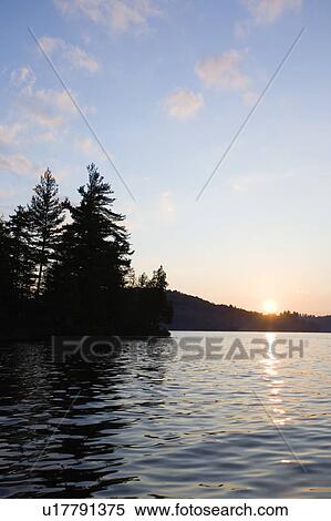 USA, New York State, Adirondack Mountains, Upper Saranac Lake at sunset View Large Photo Image Stock Photography - USA, New York State, Adirondack Mountains, Upper Saranac Lake at sunset. Fotosearch
