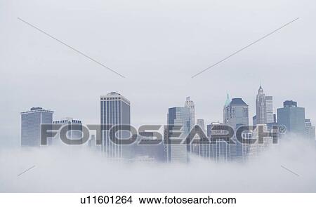Picture - USA, New York State, New York City, Skyline in fog. Fotosearch