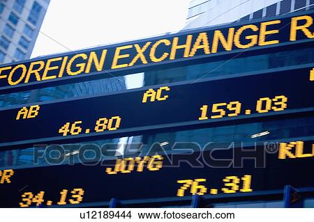 Picture - USA, New York State, New York City, Times Square, Stock Quotron, close-up. Fotosearch