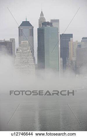 Picture - USA, New York State, New York City, Skyline in fog. Fotosearch