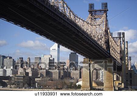 USA, New York State, New York City, City skyline with Queensboro Bridge on foreground View Large Photo Image Stock Image - USA, New York State, New York City, City skyline with Queensboro Bridge on foreground. Fotosearch