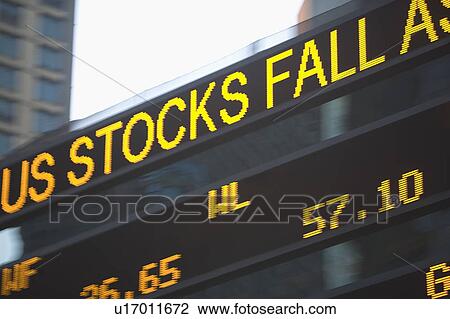 Stock Image - USA, New York State, New York City, Times Square, Stock Quotron, close-up. Fotosearch