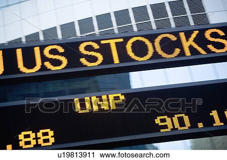 Stock Image - USA, New York State, New York City, Times Square, Stock Quotron, close-up. Fotosearch