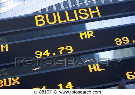 Stock Photo - USA, New York State, New York City, Times Square, Stock Quotron, close-up. Fotosearch