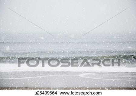 Picture - USA, New York State, Rockaway Beach, snow storm on beach. Fotosearch