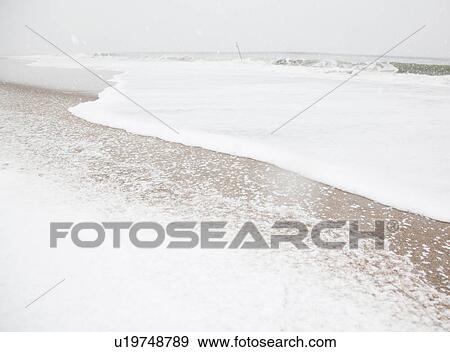 Stock Photo - USA, New York State, Rockaway Beach, beach in winter. Fotosearch