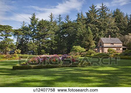 Stock Photo - USA, Oregon, house in garden. Fotosearch