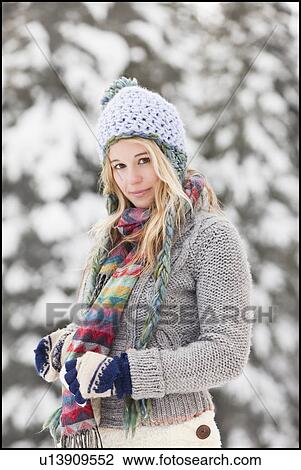 USA, Utah, Salt Lake City, portrait of young woman in winter clothing View Large Photo Image Stock Image - USA, Utah, Salt Lake City, portrait of young woman in winter clothing. Fotosearch