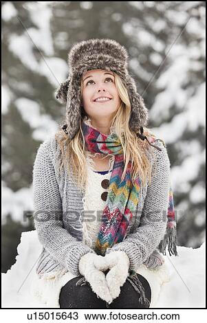 USA, Utah, Salt Lake City, portrait of young woman in winter clothing View Large Photo Image Stock Image - USA, Utah, Salt Lake City, portrait of young woman in winter clothing. Fotosearch