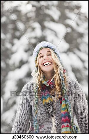 USA, Utah, Salt Lake City, portrait of young woman in winter clothing View Large Photo Image Stock Image - USA, Utah, Salt Lake City, portrait of young woman in winter clothing. Fotosearch