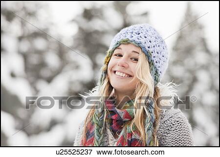 USA, Utah, Salt Lake City, portrait of young woman in winter clothing View Large Photo Image Stock Photo - USA, Utah, Salt Lake City, portrait of young woman in winter clothing. Fotosearch