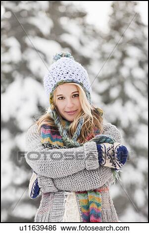 Stock Photograph - USA, Utah, Salt Lake City, portrait of young woman in winter clothing. Fotosearch