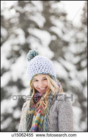 USA, Utah, Salt Lake City, portrait of young woman in winter clothing View Large Photo Image Stock Photography - USA, Utah, Salt Lake City, portrait of young woman in winter clothing. Fotosearch