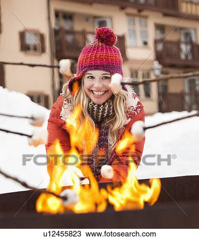 USA, Utah, Salt Lake City, young woman cooking barbecue in winter View Large Photo Image Stock Image - USA, Utah, Salt Lake City, young woman cooking barbecue in winter. Fotosearch