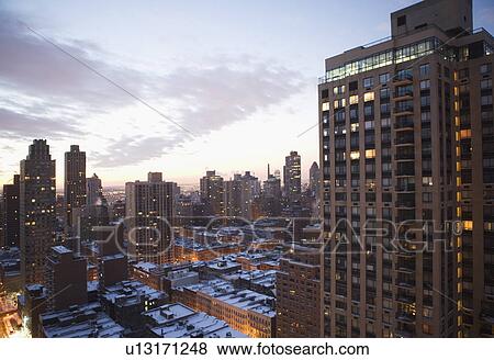 Stock Photo - USA, View of New York City covered with snow . Fotosearch