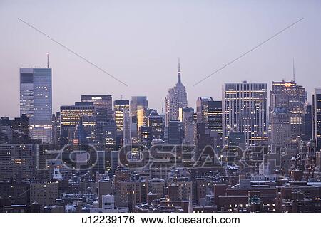 Stock Photograph - USA, View of New York City covered with snow . Fotosearch