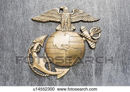 Stock Image - USA, Virginia, close up of US Marines insignia. Fotosearch