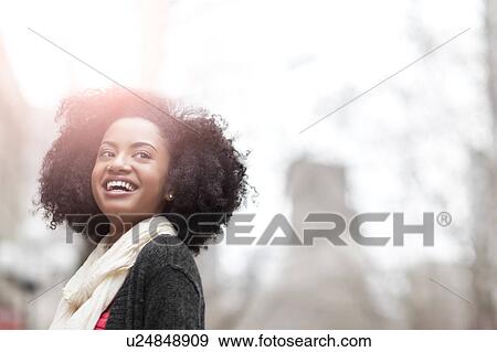 USA, Washington State, Seattle, Portrait of cheerful young woman View Large Photo Image Stock Photo - USA, Washington State, Seattle, Portrait of cheerful young woman. Fotosearch