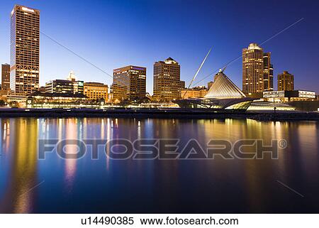Stock Photography - USA, Wisconsin, Milwaukee, Skyline illuminated at night. Fotosearch