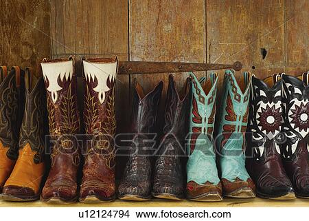 Picture - Variation of cowboy shoes. Fotosearch