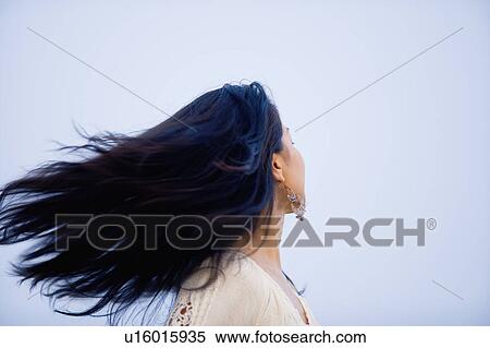 Windswept young woman View Large Photo Image Stock Photography - Windswept young woman . Fotosearch